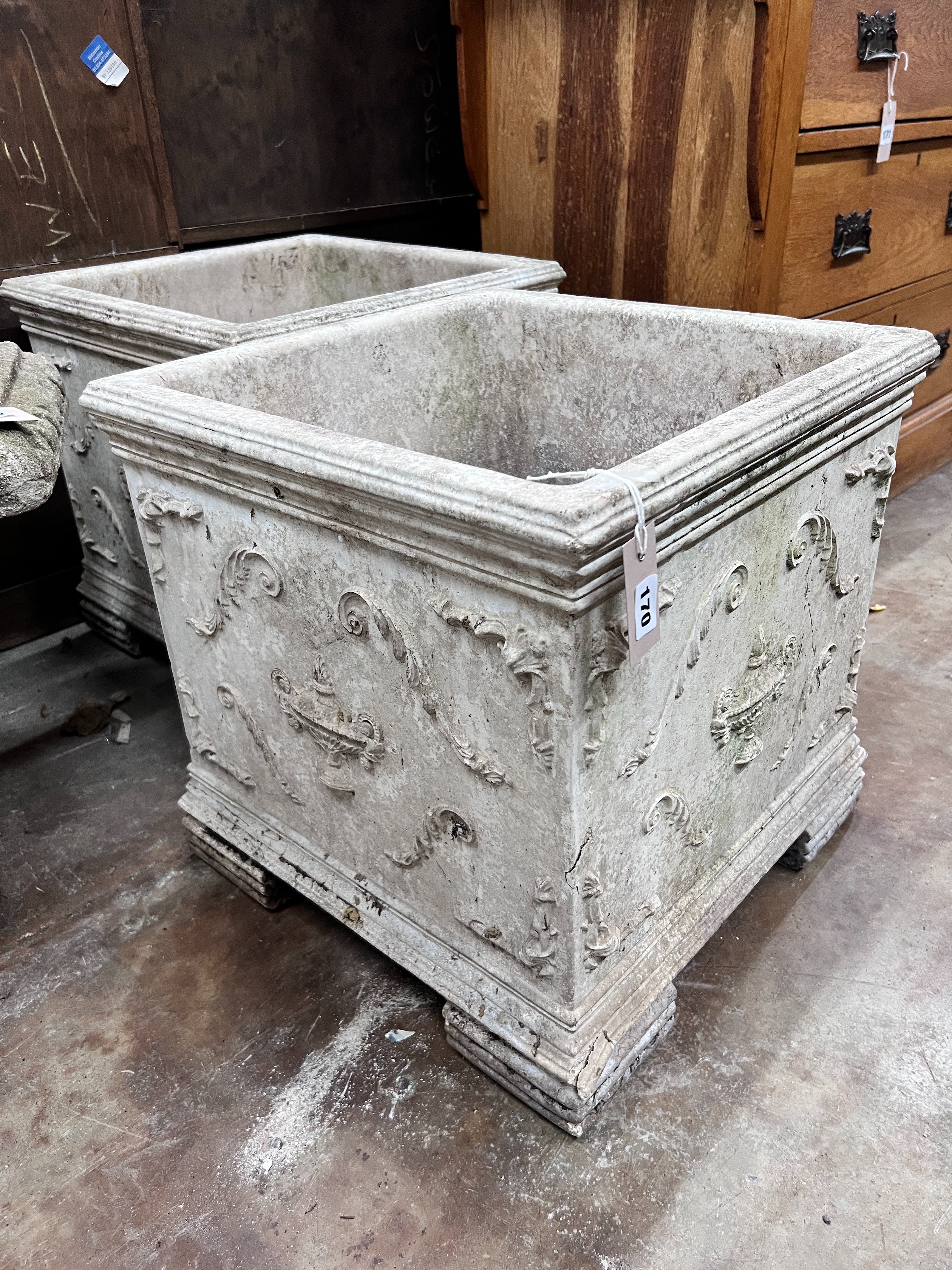 A pair of reconstituted stone square garden planters, width 48cm, height 47cm *Please note the sale commences at 9am.